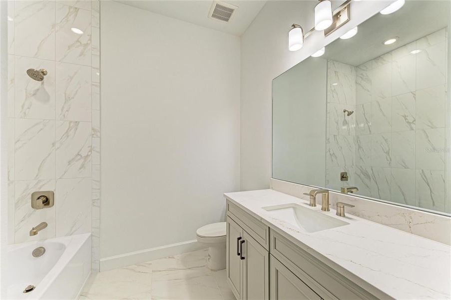 Furnished interior view inside a new home in Esplanade at Azario Lakewood Ranch, Lakewood Ranch (Image 12). Furnished interior view inside a new home in Esplanade at Azario Lakewood Ranch, Lakewood Ranch (Image 12).