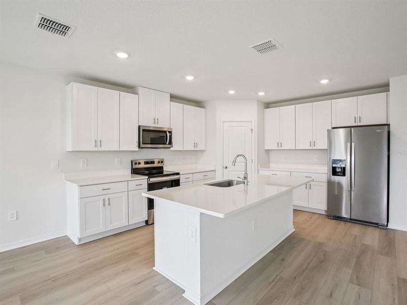Furnished interior view inside a new home in Oakfield Trails - Classic Series, Parrish (Image 7).