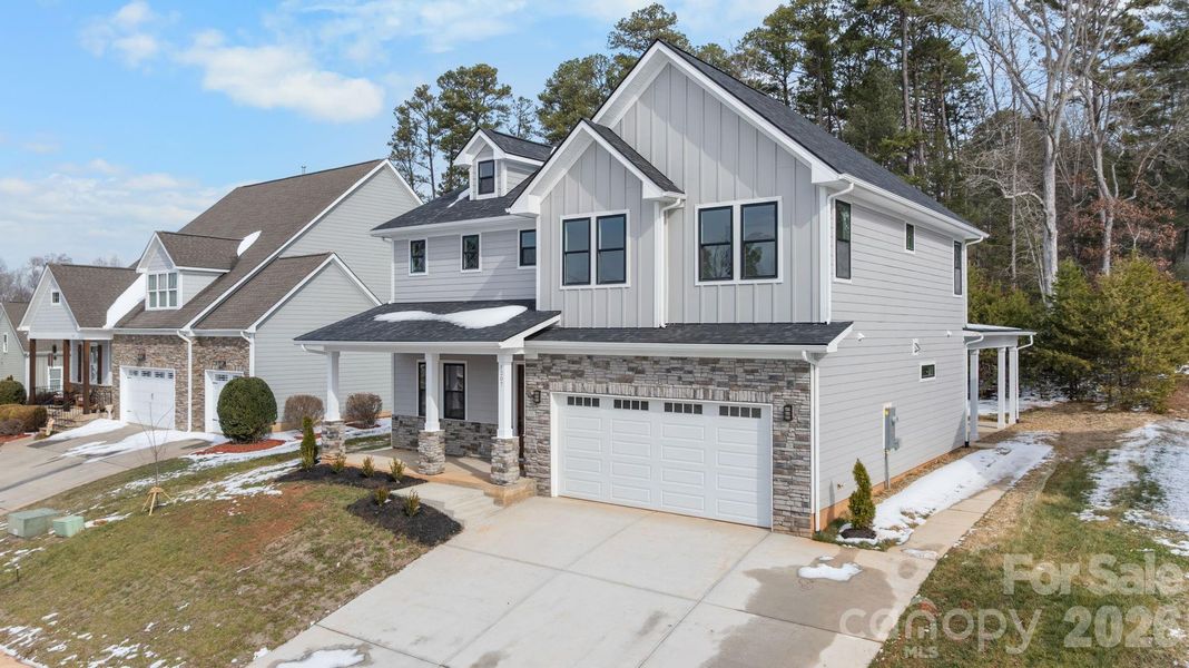 Front exterior of a new home in , Hickory, NC, highlighting curb appeal (Image 29).