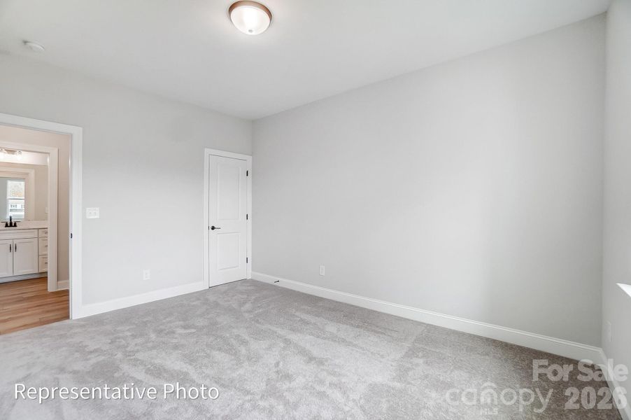Spacious, unfurnished interior of a new home in Rone Creek, Waxhaw (Image 31).