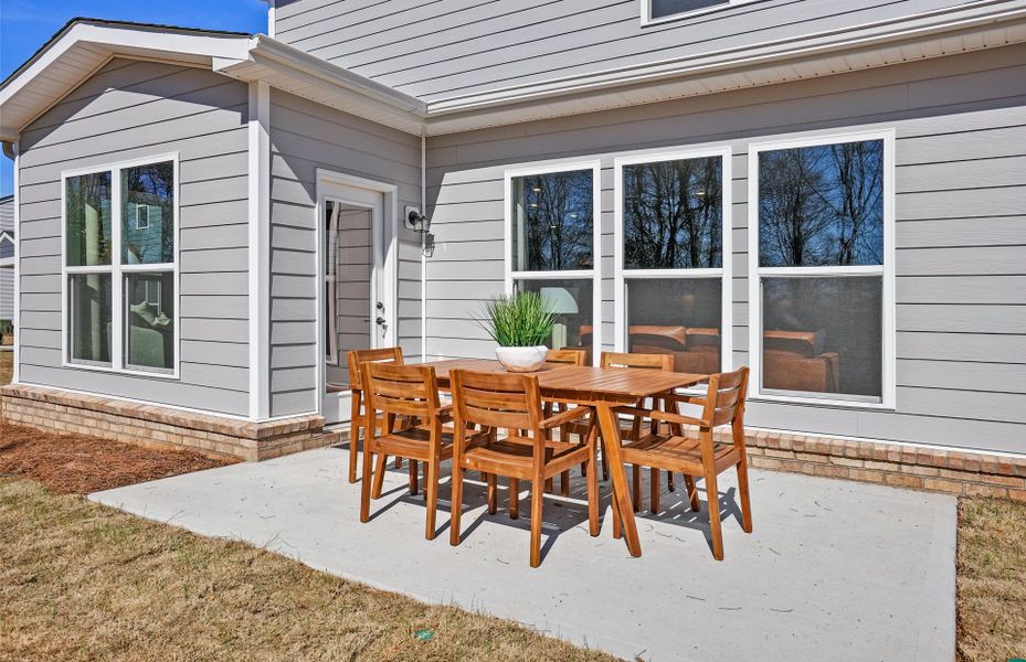Exterior details and patio area of a home in Riverstone, Monroe (Image 3).