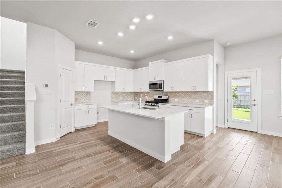 Furnished interior view inside a new home in Trace, San Marcos (Image 9).
