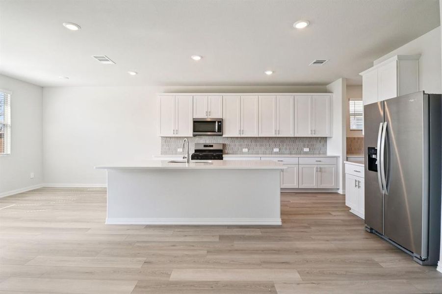 Furnished interior view inside a new home in Lakehaven - Premier Series, Farmersville (Image 12).