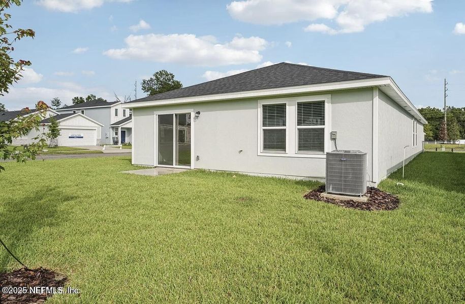 Exterior details and patio area of a home in Kings Crossing, Jacksonville (Image 3).