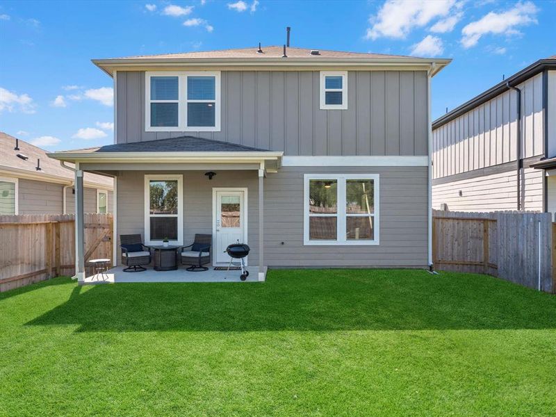 This backyard is perfect for family gatherings, social events, or simply unwinding in the fresh air.