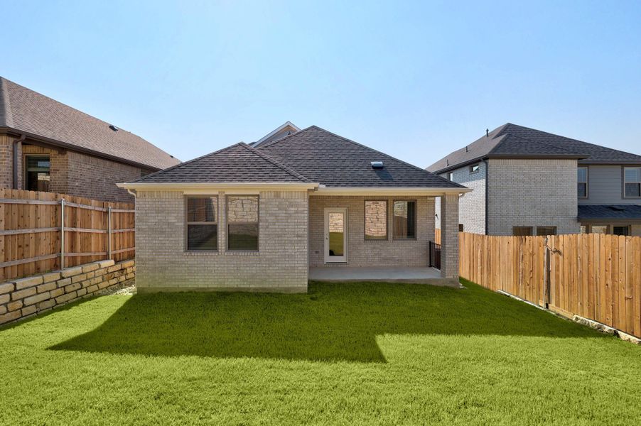 Exterior details and patio area of a home in Lakeside at Tessera, Lago Vista (Image 4).