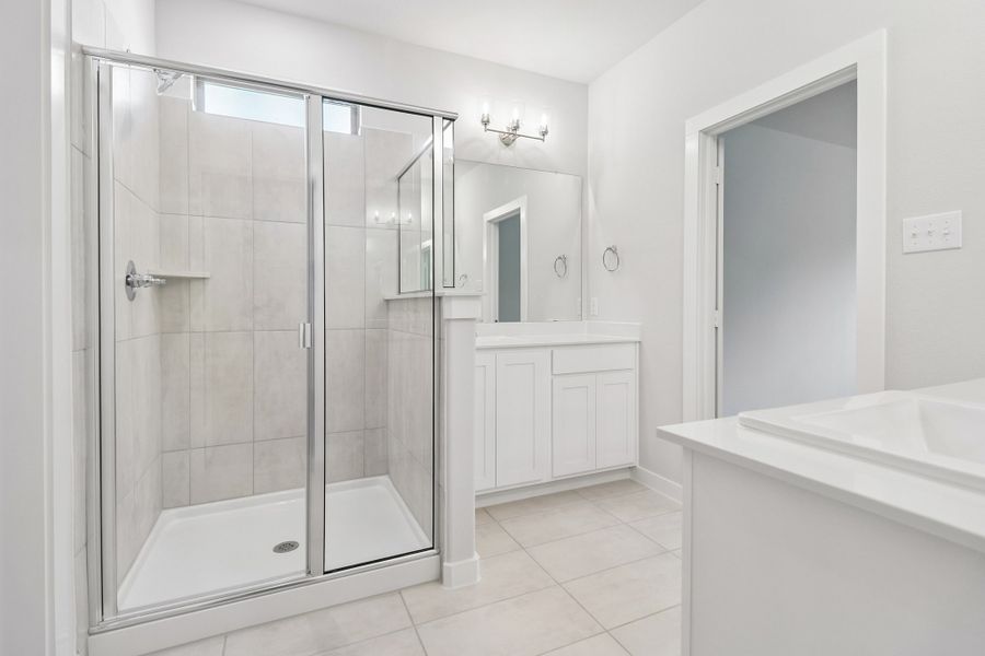 Primary Bathroom in the Masters home plan by Trophy Signature Homes