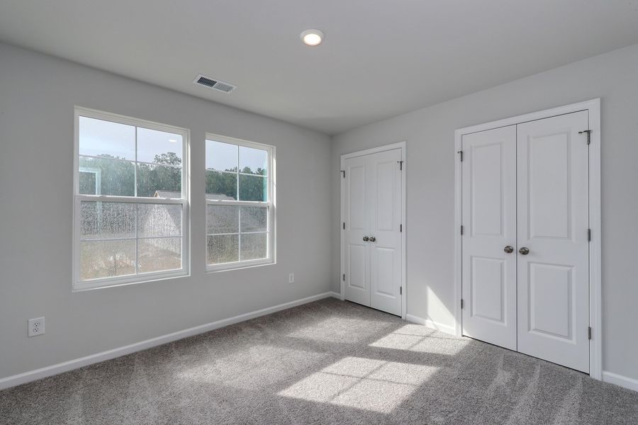 Spacious, unfurnished interior of a new home in Hainer Place, Conway (Image 27).