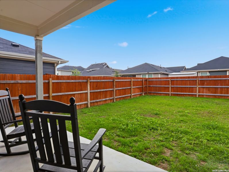 Exterior details and patio area of a home in Watermill, Uhland (Image 4).