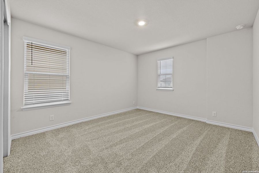 Spacious, unfurnished interior of a new home in Redbird Ranch, San Antonio (Image 11).