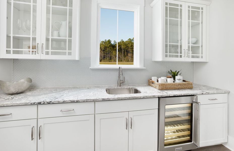 The optional Butler's Pantry offers additional storage space and mini fridge