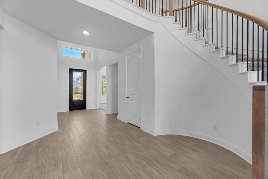 Spacious, unfurnished interior of a new home in Sienna, Missouri City (Image 13). Spacious, unfurnished interior of a new home in Sienna, Missouri City (Image 13).