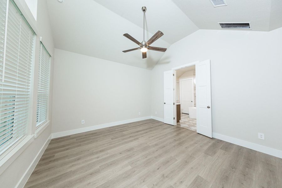 Additional view from primary bedroom looking towards the double door entrance to primary ensuite bathroom.