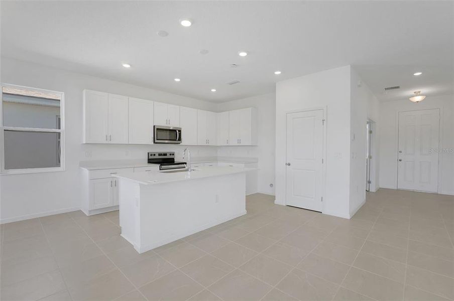 Furnished interior view inside a new home in Willowbrook North, Winter Haven (Image 12).
