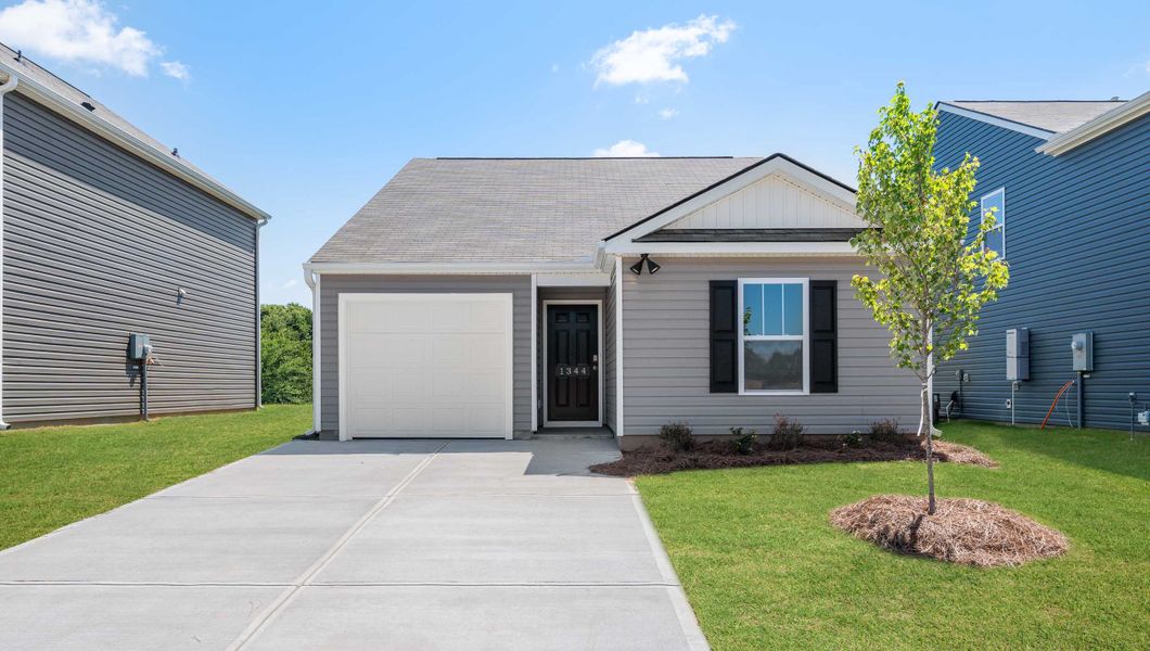 Front exterior of a new home in Harper Ridge, Roebuck, SC, highlighting curb appeal (Image 1).