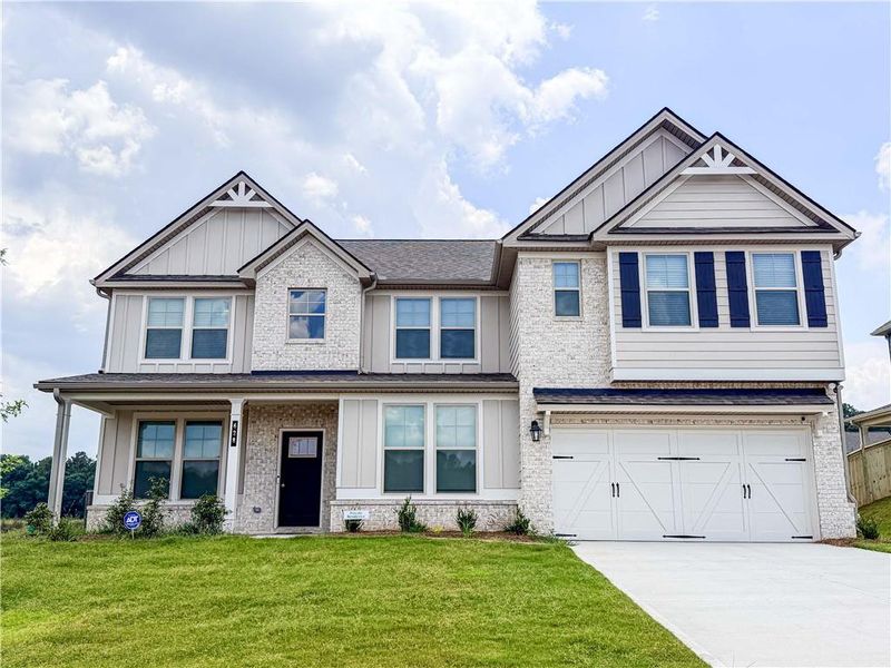 Front exterior of a new home in , Stockbridge, GA, highlighting curb appeal (Image 37).