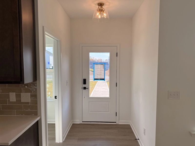 Foyer featuring AW Collection® Oxford - Natural light and bold details create an inviting first impression.