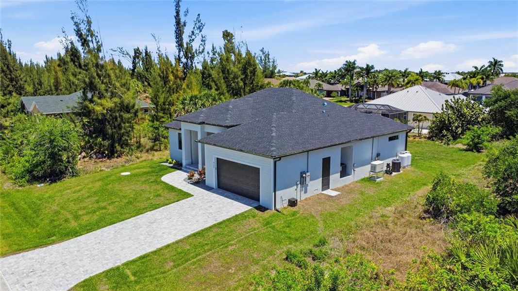 Front exterior of a new home in , Port Charlotte, FL, highlighting curb appeal (Image 23).