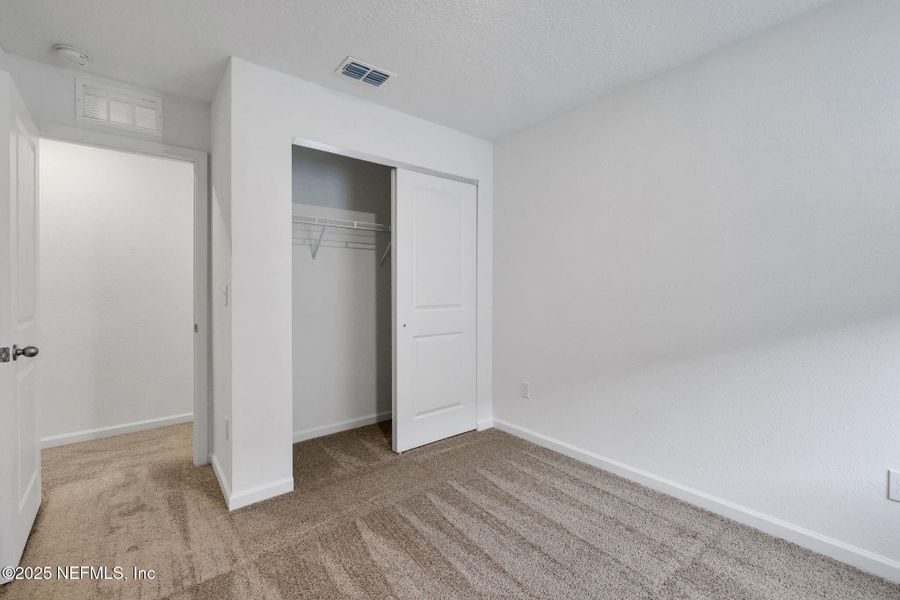 Spacious, unfurnished interior of a new home in Kasen Oaks, Jacksonville (Image 26).