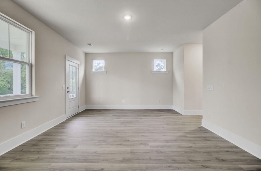 Spacious, unfurnished interior of a new home in Indigo Grove Single Family Homes, Johns Island (Image 54).