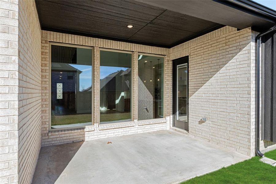 Exterior details and patio area of a home in Willow Wood, McKinney (Image 27).