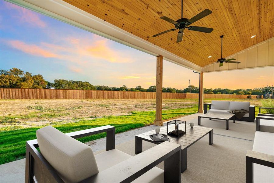 HUGE back porch with beautiful detailing, dual fans, and a room for all! *Virtually staged.