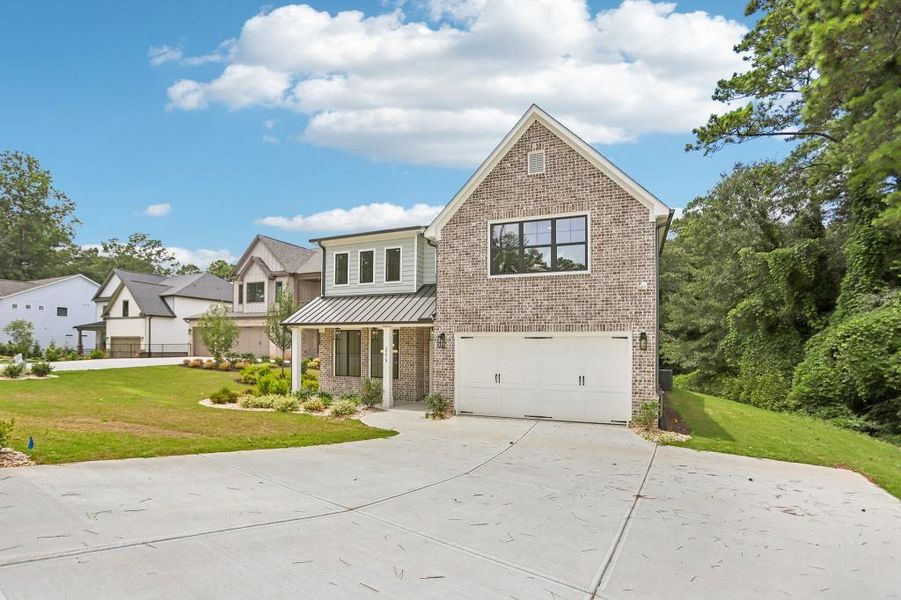Front exterior of a new home in , Marietta, GA, highlighting curb appeal (Image 23). Front exterior of a new home in , Marietta, GA, highlighting curb appeal (Image 23).
