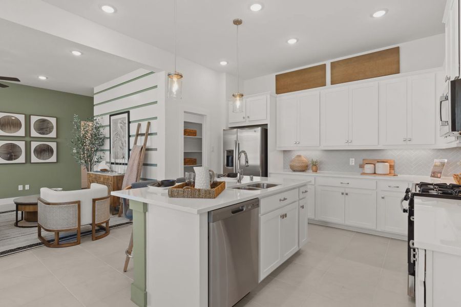 Representative furnished interior of a home built from the Versailles by Chesmar Homes in The Woodland Hills Chateau, Willis (Image 7).