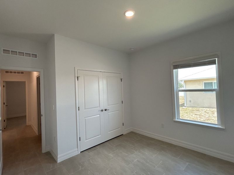 Spacious, unfurnished interior of a new home in Burnt Store, Cape Coral (Image 23). Spacious, unfurnished interior of a new home in Burnt Store, Cape Coral (Image 23).