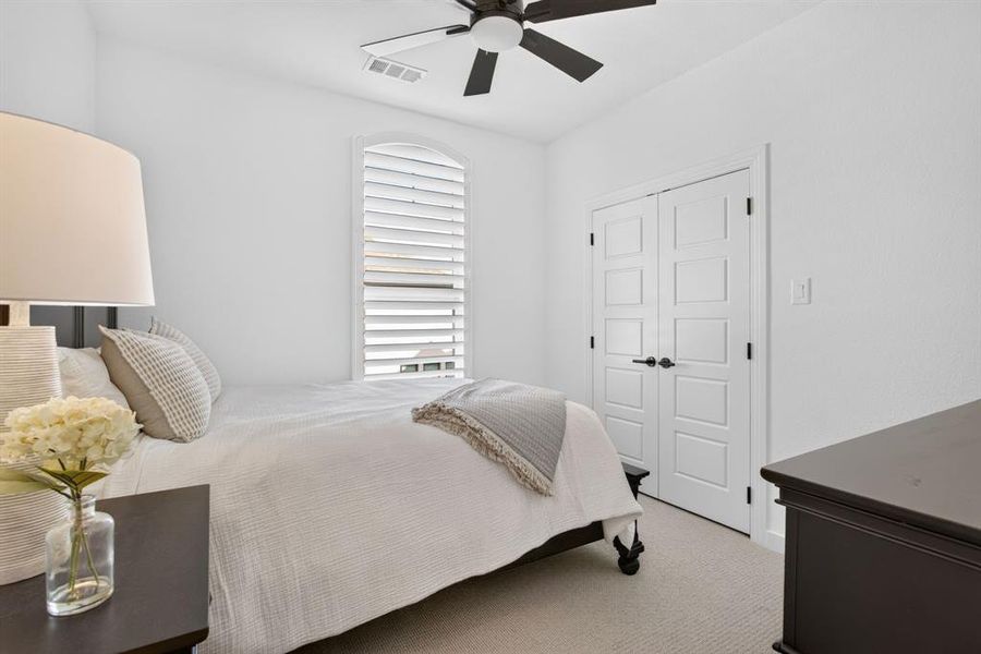 Secondary bedrooms upstairs - the plantation shutters and the custom fans continue! Secondary bedrooms upstairs - the plantation shutters and the custom fans continue!