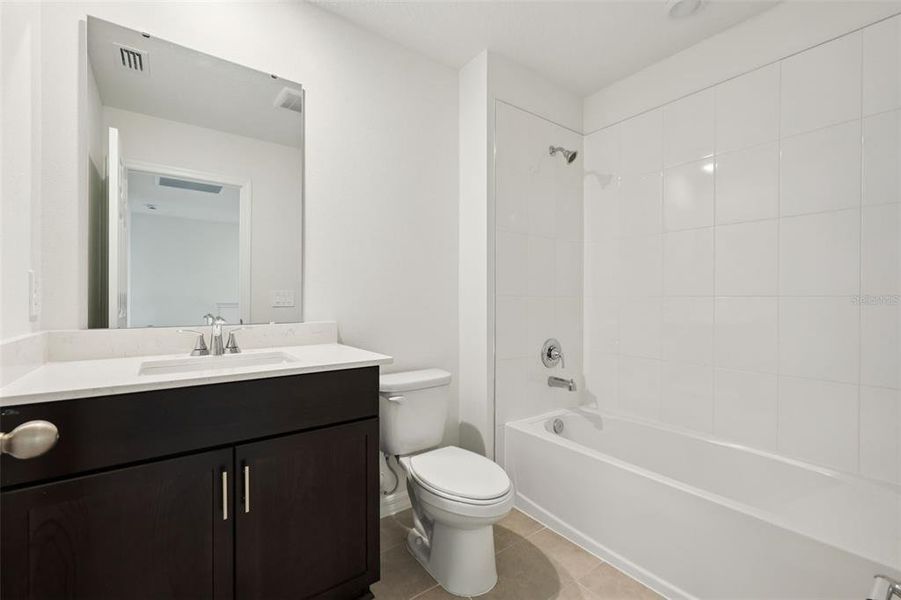 Furnished interior view inside a new home in Cagan Crossings West, Clermont (Image 6).