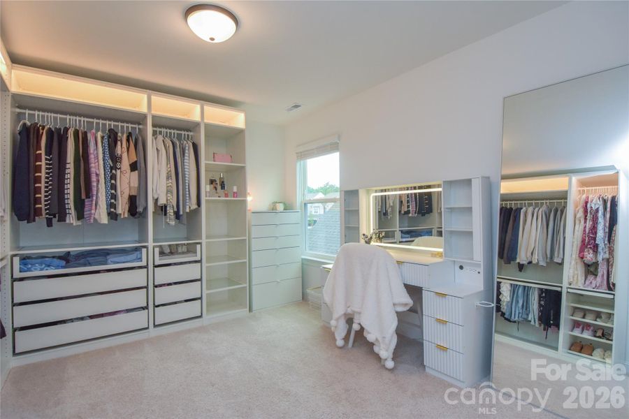 Custom closet / sitting area