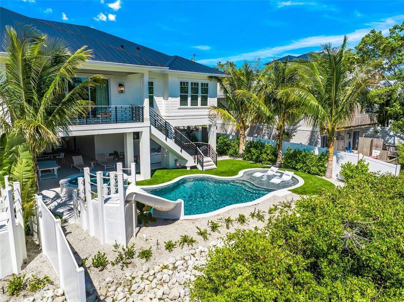 Front exterior of a new home in , Sarasota, FL, highlighting curb appeal (Image 34).
