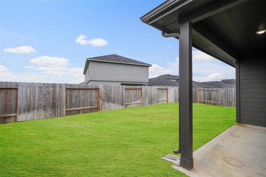 Exterior details and patio area of a home in , Houston (Image 4). Exterior details and patio area of a home in , Houston (Image 4).