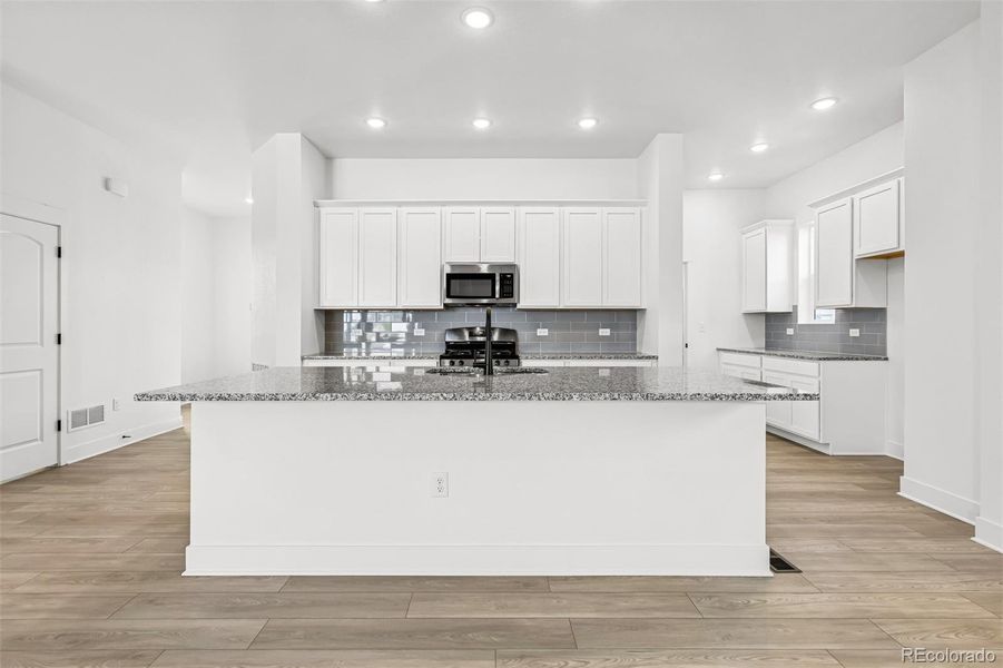 Furnished interior view inside a new home in Painted Prairie Cottage, Aurora (Image 13).