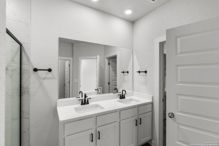 Furnished interior view inside a new home in August Fields, New Braunfels (Image 12).