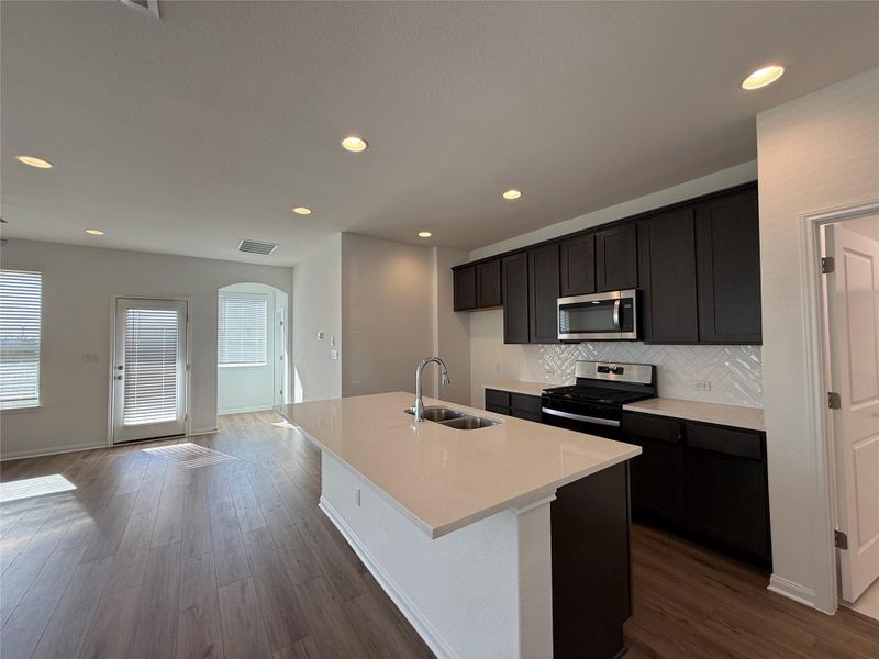 Furnished interior view inside a new home in Wellspring, Round Rock (Image 9). Furnished interior view inside a new home in Wellspring, Round Rock (Image 9).