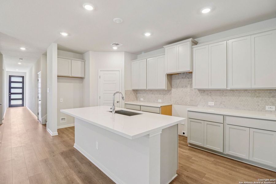 Furnished interior view inside a new home in Estancia Ranch - Premier Series, San Antonio (Image 14). Furnished interior view inside a new home in Estancia Ranch - Premier Series, San Antonio (Image 14).