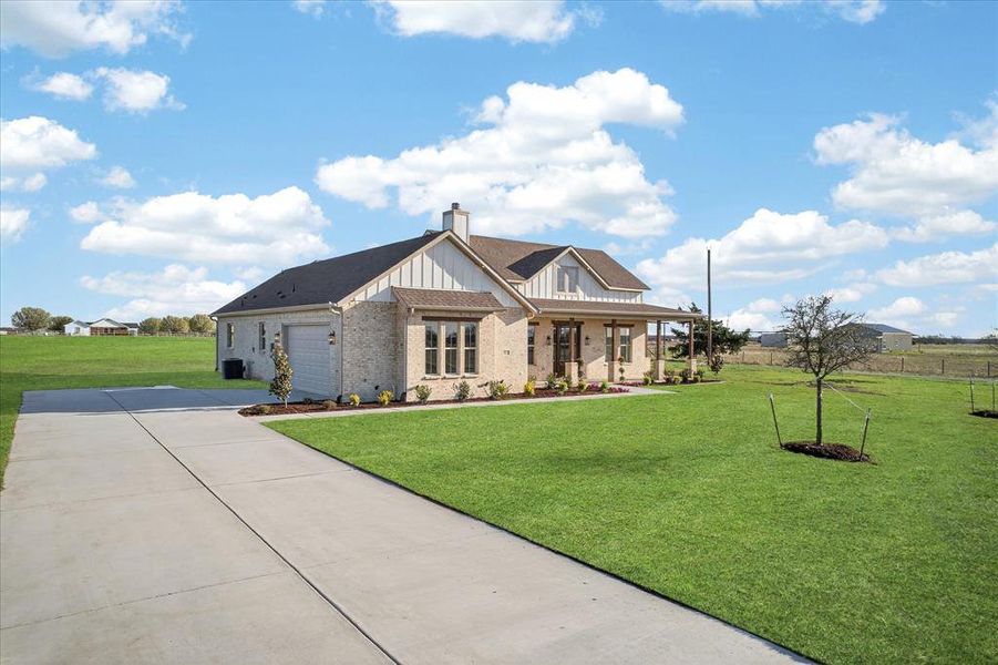 Front exterior of a new home in , Celeste, TX, highlighting curb appeal (Image 27).
