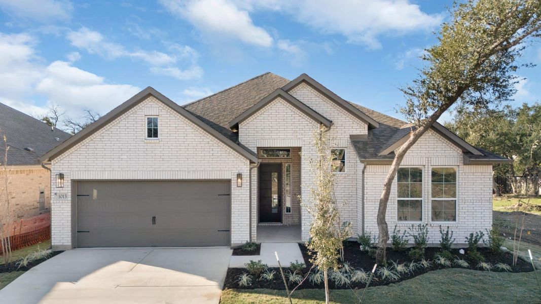 Front exterior of a new home in Highland Village, Georgetown, TX, highlighting curb appeal (Image 17).