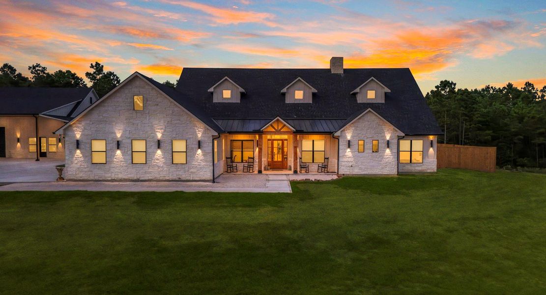 Front exterior of a new home in , Onalaska, TX, highlighting curb appeal (Image 21).