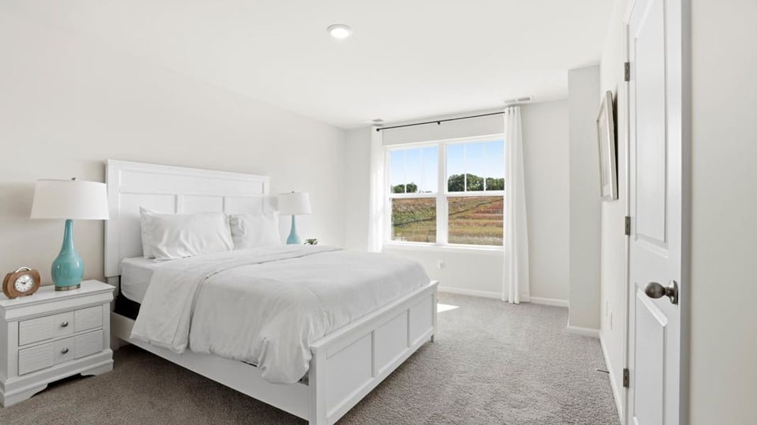 Furnished interior view inside a new home in Tanglewood Townes, Greenville (Image 27).
