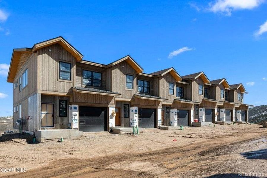 Front exterior of a new home in , Granby, CO, highlighting curb appeal (Image 20).