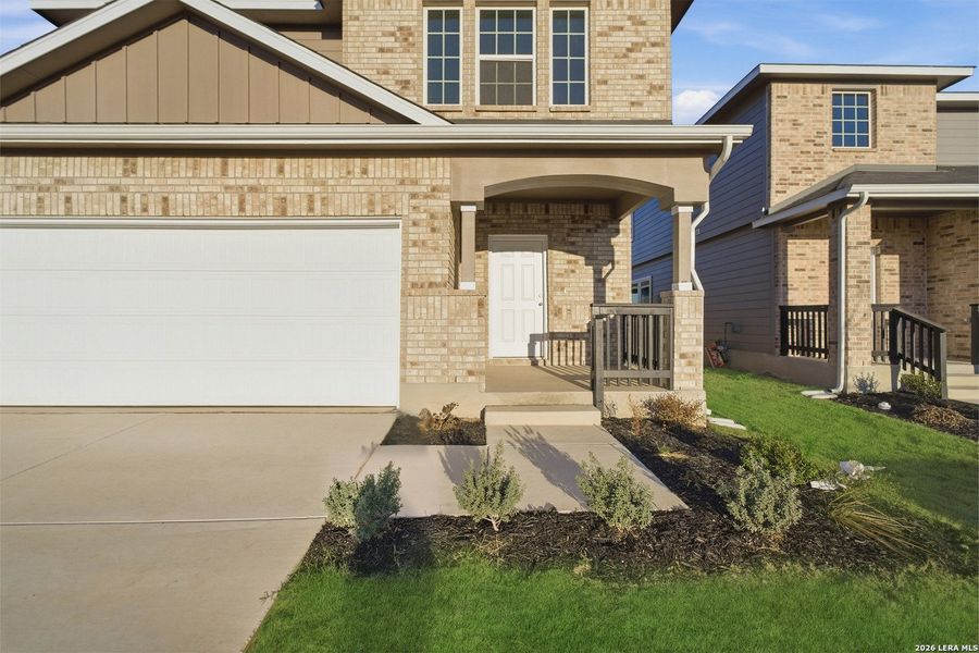 Front exterior of a new home in Garden Grove, San Antonio, TX, highlighting curb appeal (Image 22).