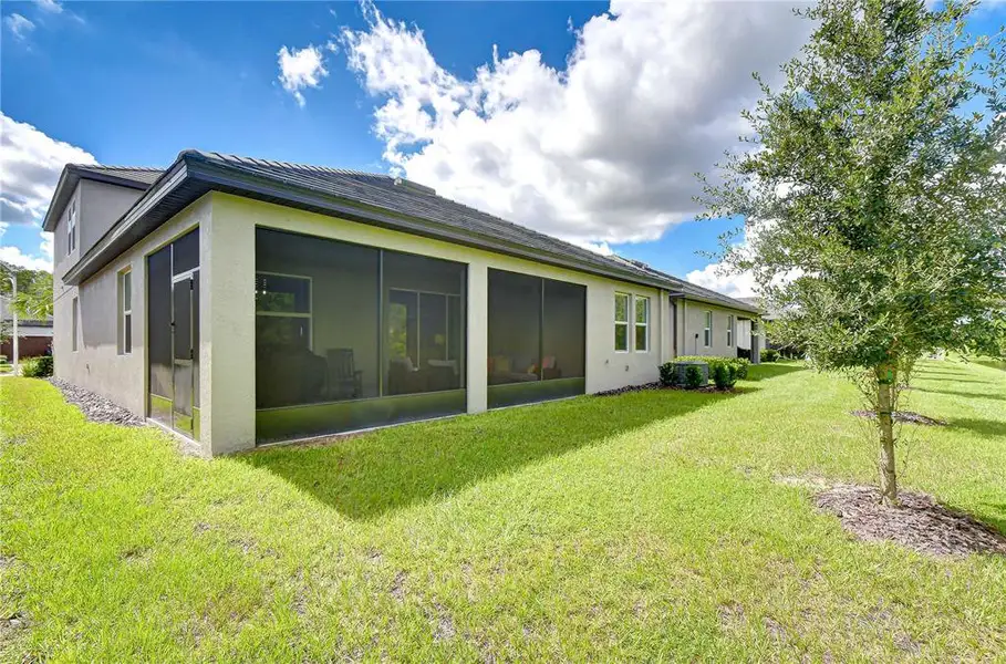 Exterior details and patio area of a home in Angeline Active Adult, Land O' Lakes (Image 23).