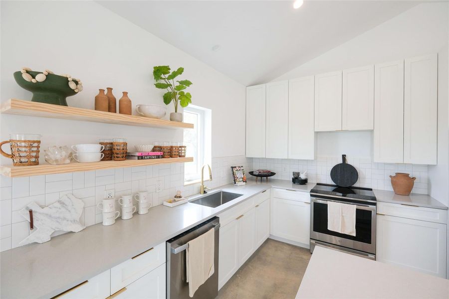 Open Concept Floorplan, with vaulted ceilings, flooded with natural light. Offering minimalistic yet high-end finishes through out the entire Hacienda.