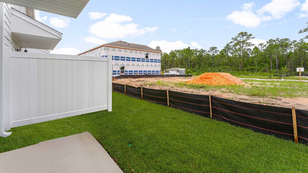 Exterior details and patio area of a home in Hawks Landing Townhomes, Santa Rosa Beach (Image 3). Exterior details and patio area of a home in Hawks Landing Townhomes, Santa Rosa Beach (Image 3).