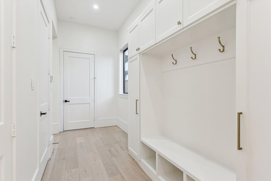 Mud area on the first floor - offers custom built-ins and closets.
