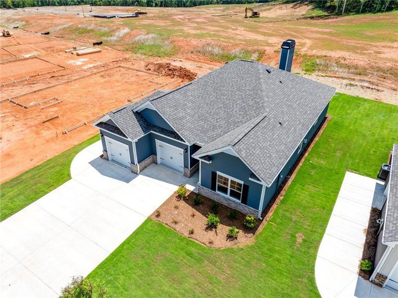 Front exterior of a new home in , Homer, GA, highlighting curb appeal (Image 5).