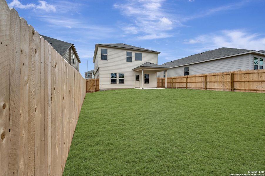 Exterior details and patio area of a home in Paloma Park, Converse (Image 3).